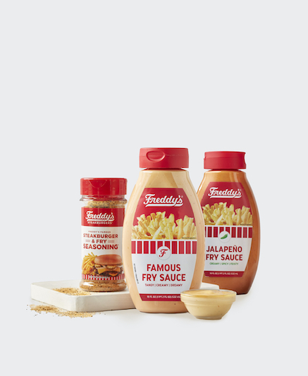 Freddy’s fry sauce, jalapeño fry sauce, and seasoning bottles